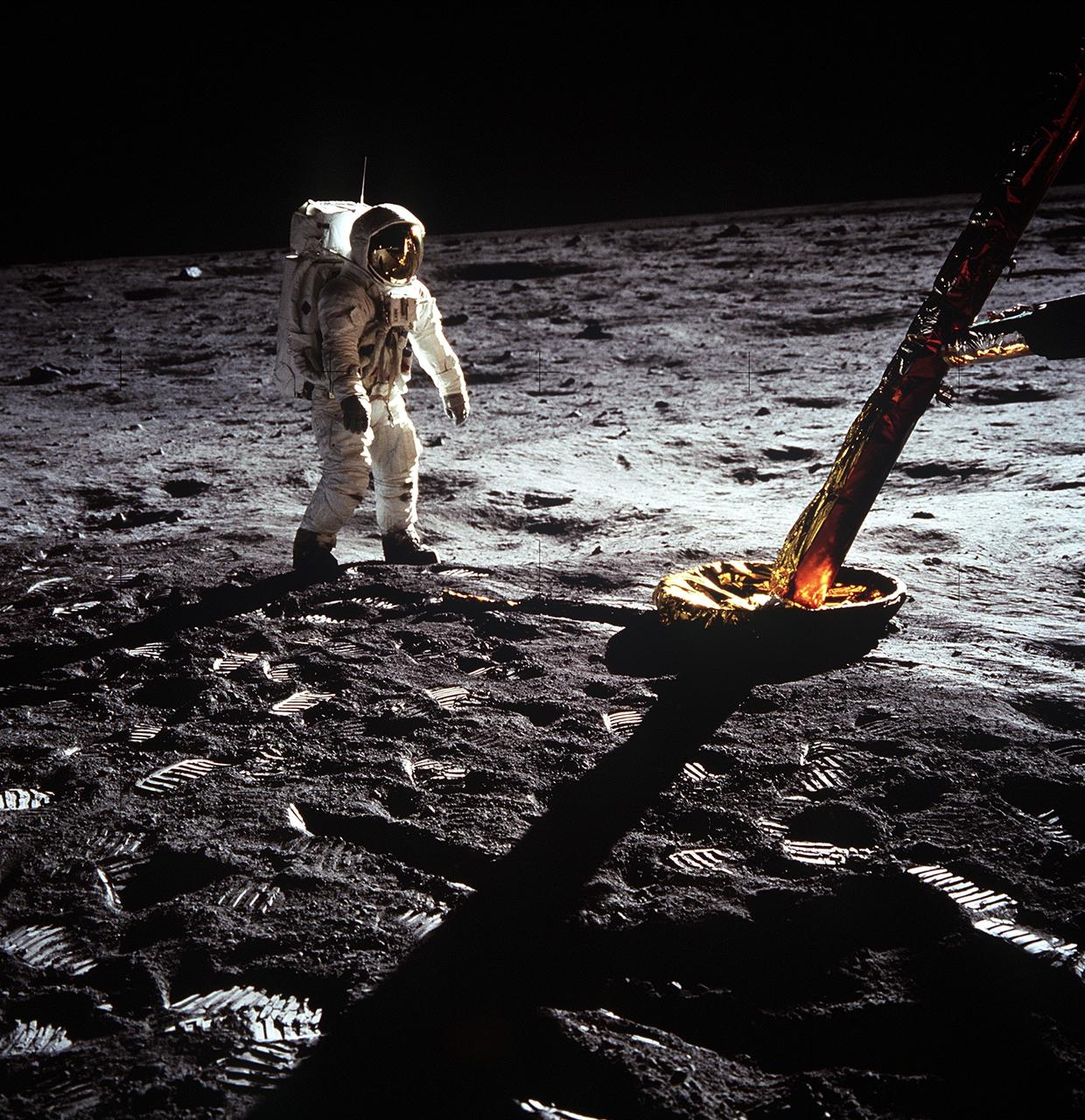 Apollo 11 frame AS11-40-5902: astronaut beside the lunar module