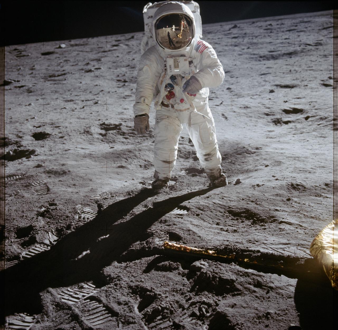 Apollo 11 frame AS11-40-5903: astronaut standing on the lunar surface